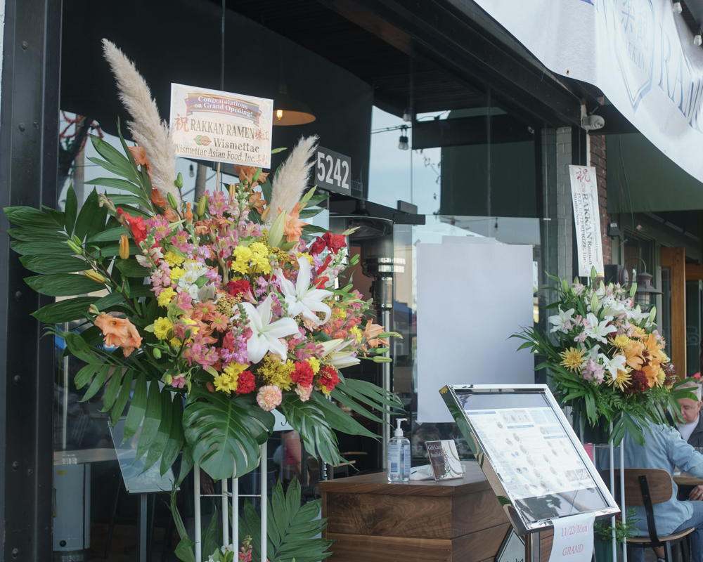 Long Beach Opening: Flowers at the entrance